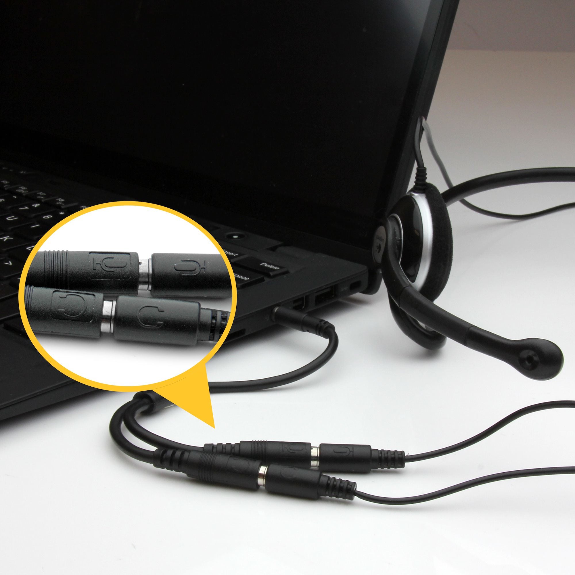 Headset adapter with headphone/mic plugs